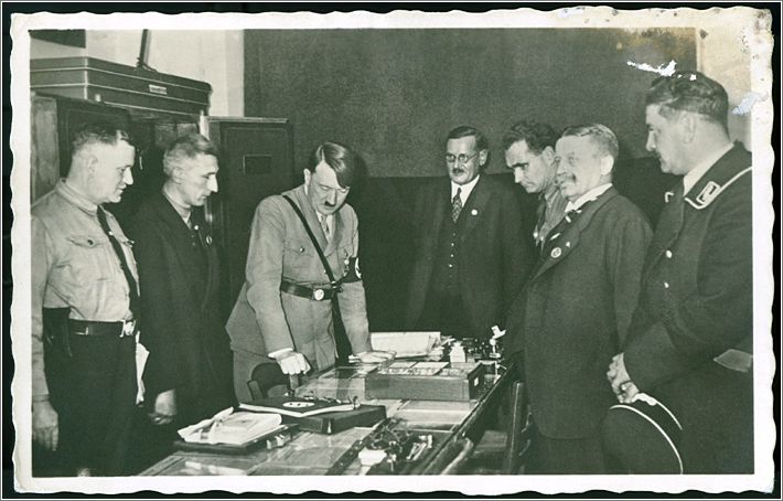 Adolf Hitler and other dignitaries at the opening of the Nazi Party museum in the Sterneckerbraeuhaus the Party's first headquarters